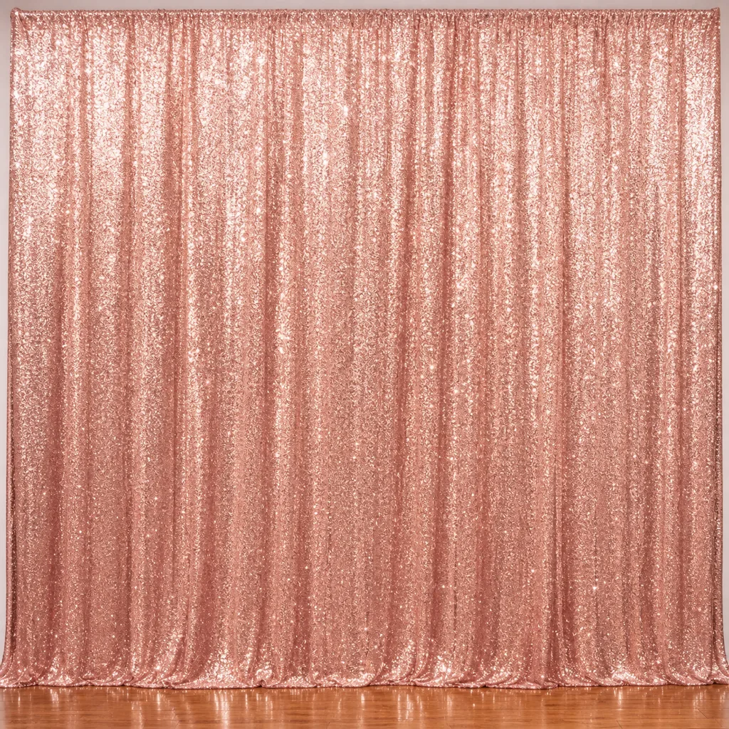 Rose gold sequin photo booth backdrop set up for a sweet 16 party